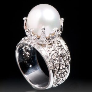 women's ring with large pearl and diamonds